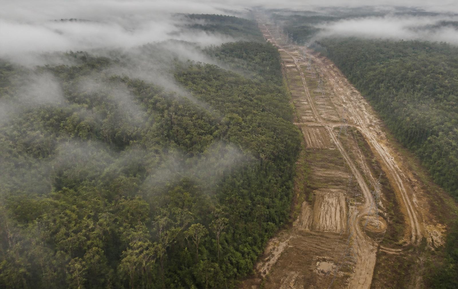 Misty Queensland landscape meeting an infrastructure corridor